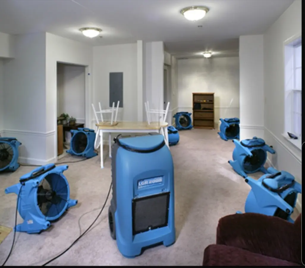 Air movers and dehumidifier setup for Water Damage Restoration in Northampton